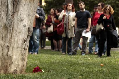 People gather at the spot where Dimitris Christoulas, 77, took his own life on Wednesday morning. (photo:Reuters)