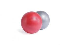 Ejercicio pilates con fitball para oblícuos