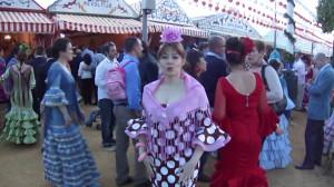 Un beso de lunares En Feria, letras de sevillanas.