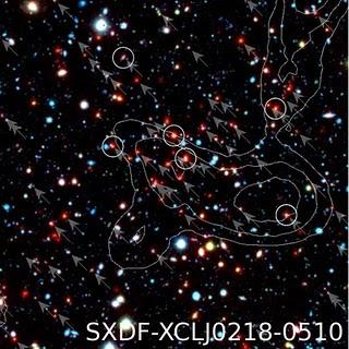 Luz invisible revela el cúmulo de galaxias más distante Luz invisible revela el cúmulo de galaxias más distante