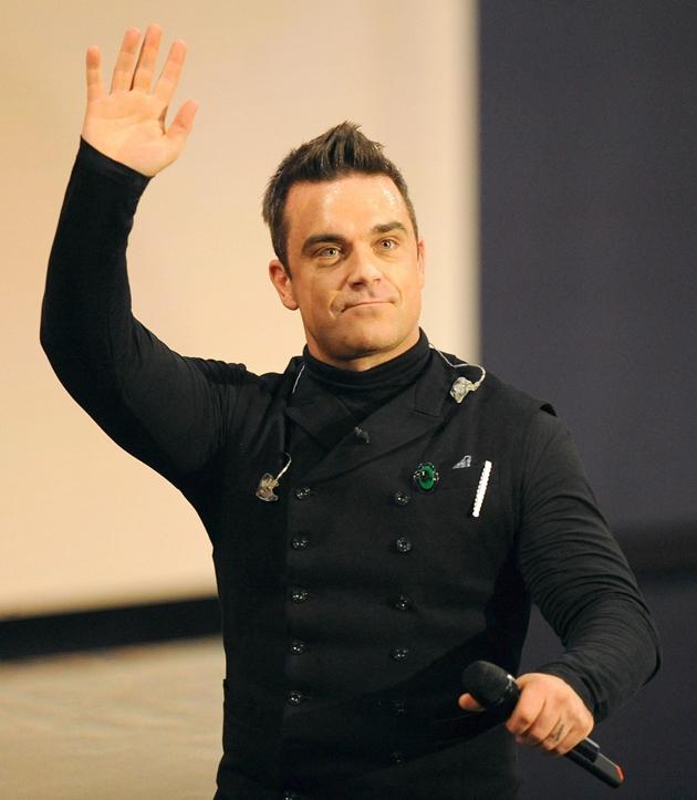 Robbie Williams vuelve ocho años después al número uno con “Candy”