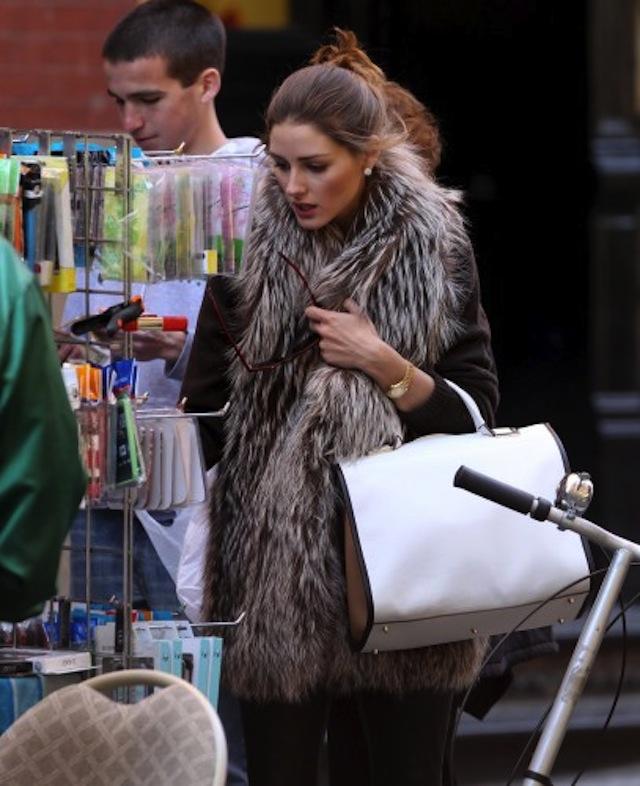 Olivia Palermo street shopping with fur vest
