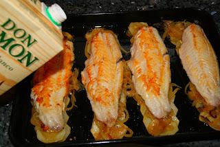 Cabracho al Horno con Patatas panadera y Lechuga de Roble Cabracho al Horno con Patatas panadera y Lechuga de Roble