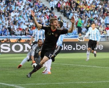 Germany's Thomas Muller celebrates scoring his sides opening goal..FIFA World Cup 2010 Quarter Finals..Argentina v Germany..3rd July, 2010.