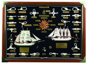 La rosa de los vientos. Artesanía marinera en cuadro con reproducciones de veleros, nudos marineros y rosa de los vientos.