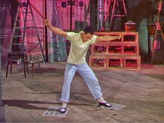 Al alegre ritmo de Gene Kelly