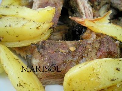 Costillar y patatas al horno