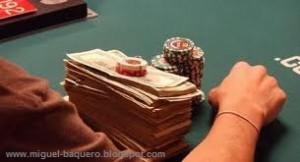 746693-poker-player-going-all-in-pushing-his-chips-forward