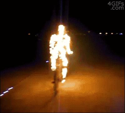 Gif-pyrotechnic-flaming-bicyclist