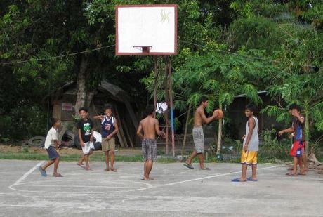 Boys playing basketball in Bagabag