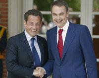 Zapatero y Sarkozy, dos caras de la misma moneda