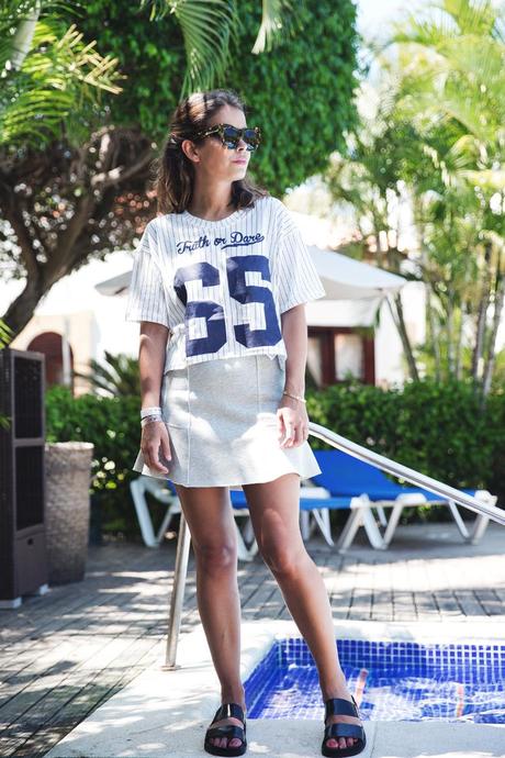 Truth or Dare Grey_Skirt-Baseball_Top-Sandals_Black-Karen_Walker_Sunglasses-Street_Style-Beach-Summer-19