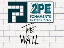 2PE Reparando un muro desde plataforma elevadora en Barcelona.