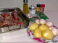 Cordero al horno con patatas Cordero al horno con patatas