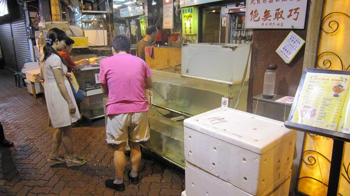 Cenando marisco en  Kai Tak, Hong Kong