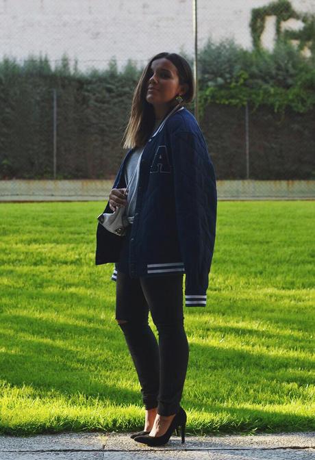 asos_varsity_jacket-grey_t-shirt-black_ripped_jeans-black_heels-street_style varsity_jacket-outfit