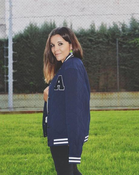 asos_varsity_jacket-grey_t-shirt-black_ripped_jeans-black_heels-street_style varsity_jacket-outfit