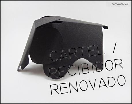 Recibidor terminado con un cartel y elefantes Recibidor terminado con un cartel y elefantes