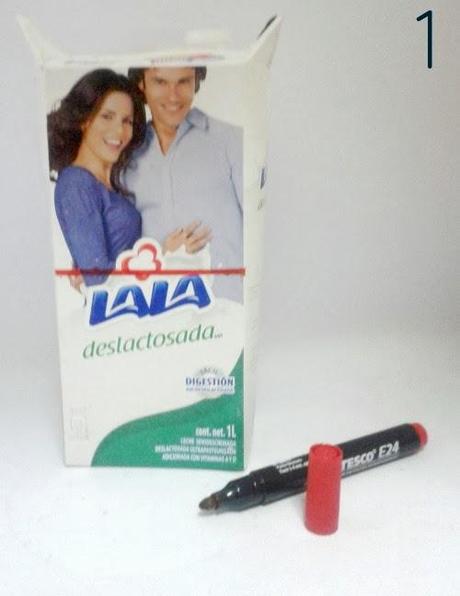 Convierte caja de leche vacía en casa de pajaros Convierte caja de leche vacía en casa de pajaros