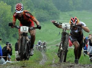 Moritz Milatz (R) of Germany competes wi