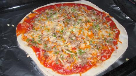 Pizza casera, masa casera de elaboración propia.