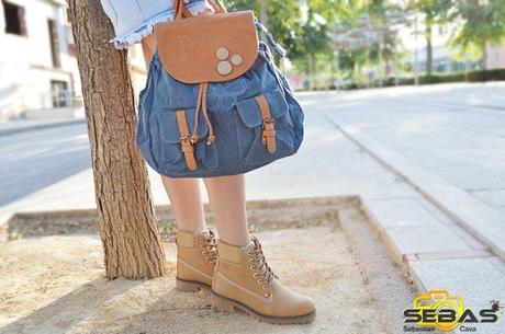 Ultimas fotos ultima temporada Tacon-es Modelo con botas y bolso