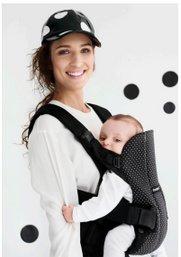 Lunares para portear a tu bebé. image