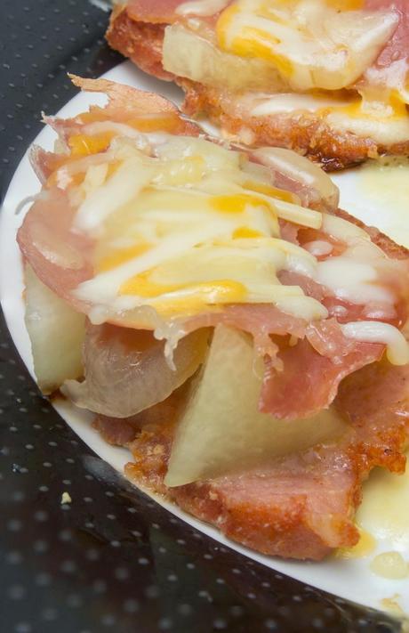 Cinta de lomo con melón y jamón gratinada a los 4 quesos Cinta de lomo con melón y jamón gratinada a los 4 quesos