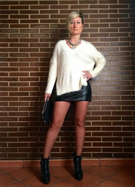 Sweater and leather skirt Sweater and leather skirt