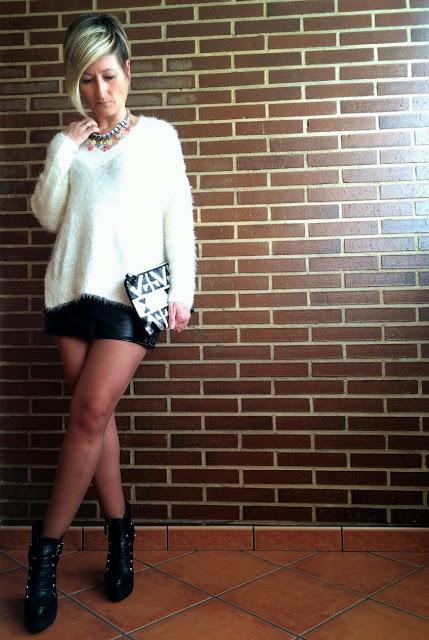 Sweater and leather skirt Sweater and leather skirt