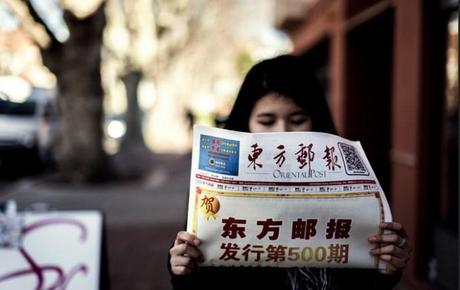 reading-chinese-newspaper-flickr