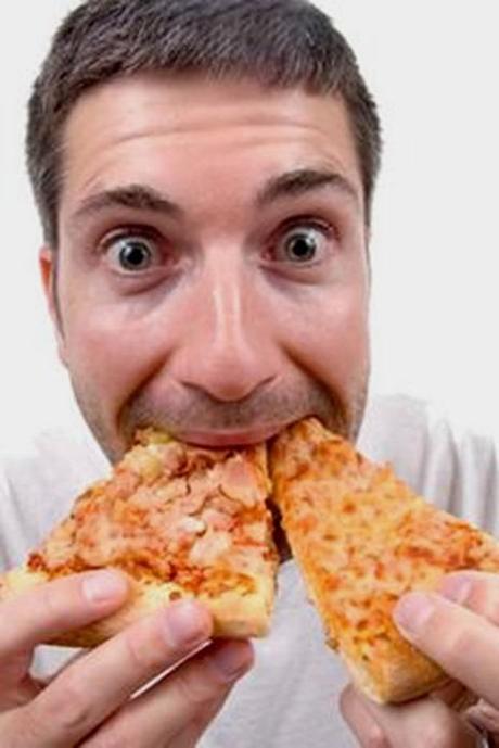 11814863_guy_eating_pizza_slcie_xlarge