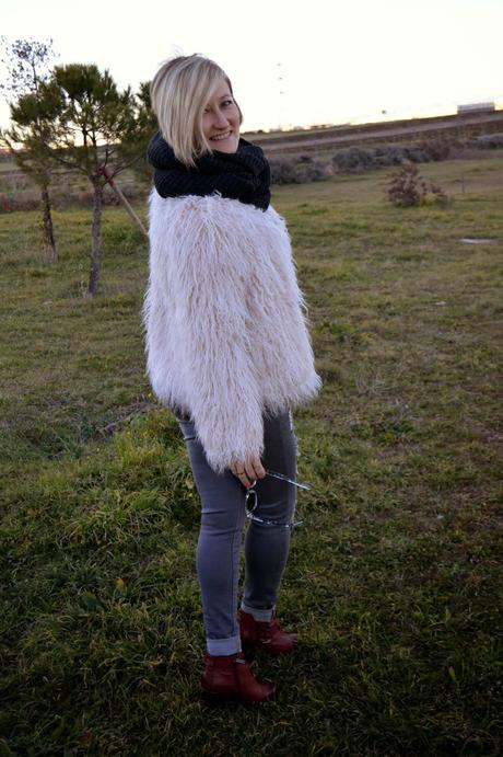 Fur coat and ripped jeans. A special shooting. Fur coat and ripped jeans. A special shooting.