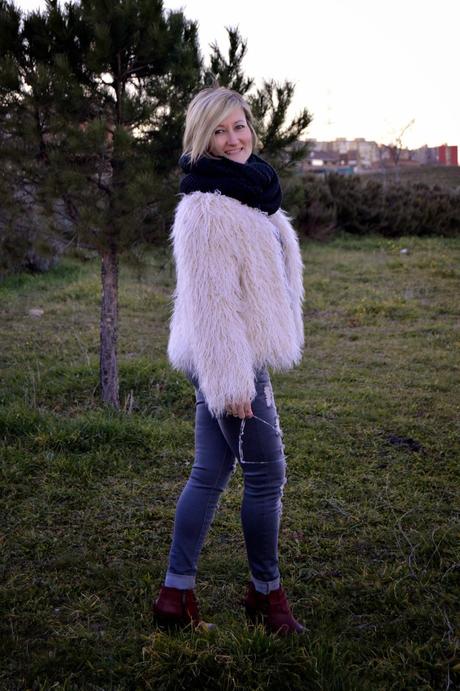 Fur coat and ripped jeans. A special shooting. Fur coat and ripped jeans. A special shooting.