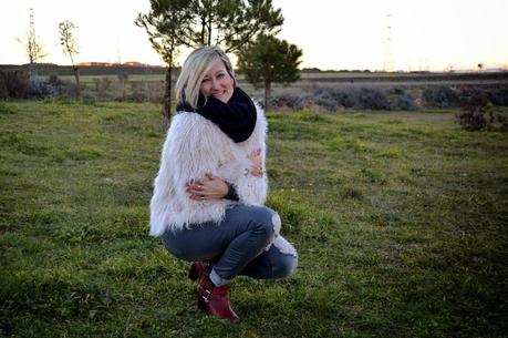 Fur coat and ripped jeans. A special shooting. Fur coat and ripped jeans. A special shooting.