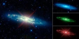 La galaxia Sculptor se muestra en diferentes colores de infrarrojo, en este nuevo mosaico de WISE