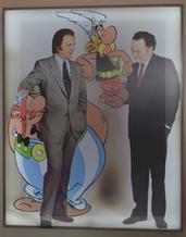 Goscinny y Uderzo con sus personajes, en un afiche infaltable. 