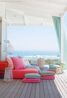 the couches with a lot of cushions look comfy Beach house..one day the beach will be my back yard :)