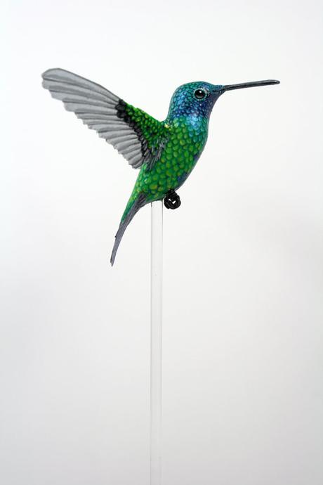 Handmade paper and resin hummingbird.