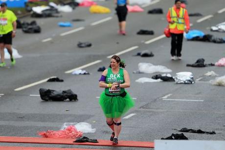 A-runner-crosses-the-start-line-to-begin-the-Virgin-Money-London-Marathon