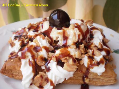 HOJALDRE CON HELADO, NATA, CARAMELO, CACAHUETES TOSTADOS Y CEREZA EN AGUARDIENTE HOJALDRE CON HELADO, NATA, CARAMELO, CACAHUETES TOSTADOS Y CEREZA EN AGUARDIENTE