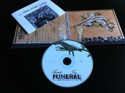 Arcade Fire: Funeral (2004) Temas con subtítulos
