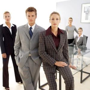 Peperones a la violeta Business Executives Posing in an Office --- Image by © Royalty-Free/Corbis