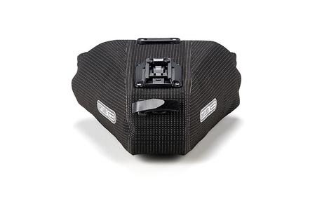Bolso para sillín Ortlieb Hi-Vis, un pequeño sistema de transportación de considerable capacidad y con cualidades reflectantes Bolso para sillín Ortlieb Hi-Vis, un pequeño sistema de transportación de considerable capacidad y con cualidades reflectantes