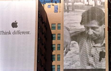 Latinos: ¿Cómo nos representamos? A poster of union leader Julio Cesar Chavez is displayed in a dowtown Los Angeles building as part of a campaign promoting Apple computers 11 February 1999. Chavez, a latino farmer's union leader and founder of United Farmers Workers of America was a key figure in the long marches and grape boycotts of the sixties in southern California before his dead in 1993.