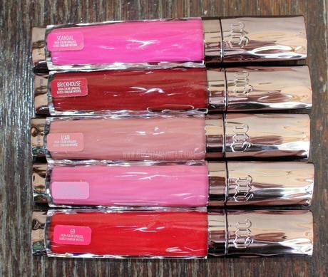 Labiales Revolution Lip Gloss de Urban Decay De arriba a abajo:
