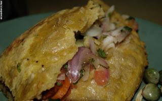 Empanadas de verde, comiendo y disfrutando