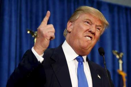 Republican presidential candidate Trump gestures and declares 