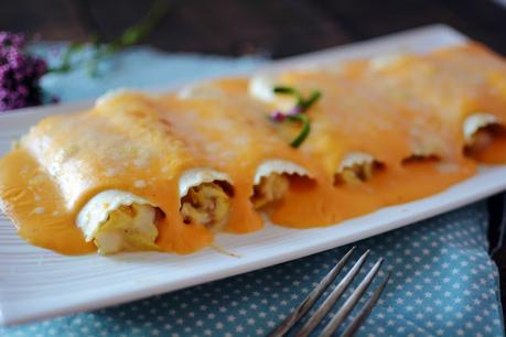 Canelones de merluza y gambas con bechamel de piquillos