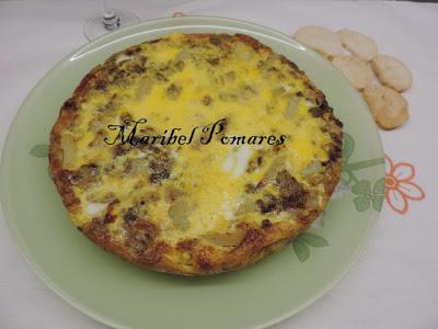 Pincho de tortilla de brocoli y patatas con queso de cabra y anchoas.